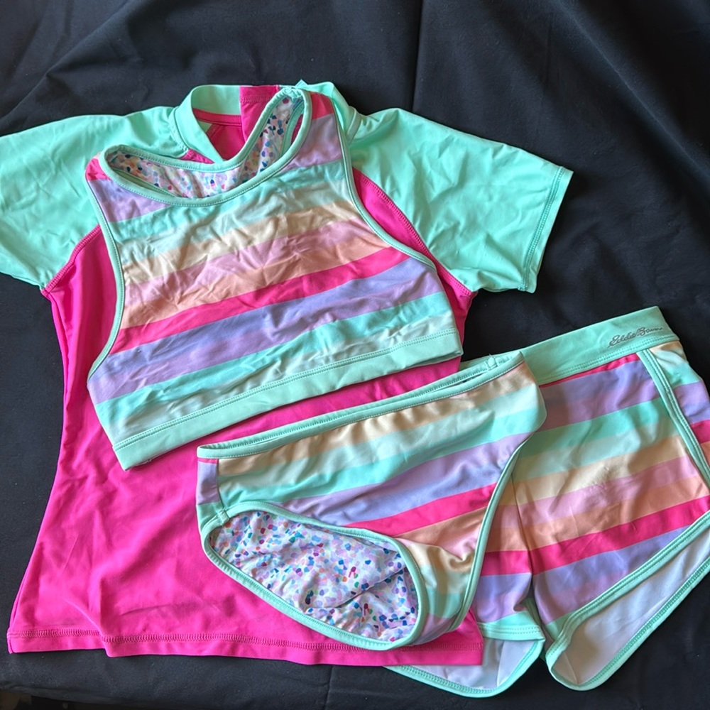 Eddie Bauer 4 piece swim set. Size M(10/12)